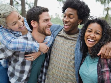 Restorative why patients choose us Group of young adults hanging outside smile showing beautiful smiles