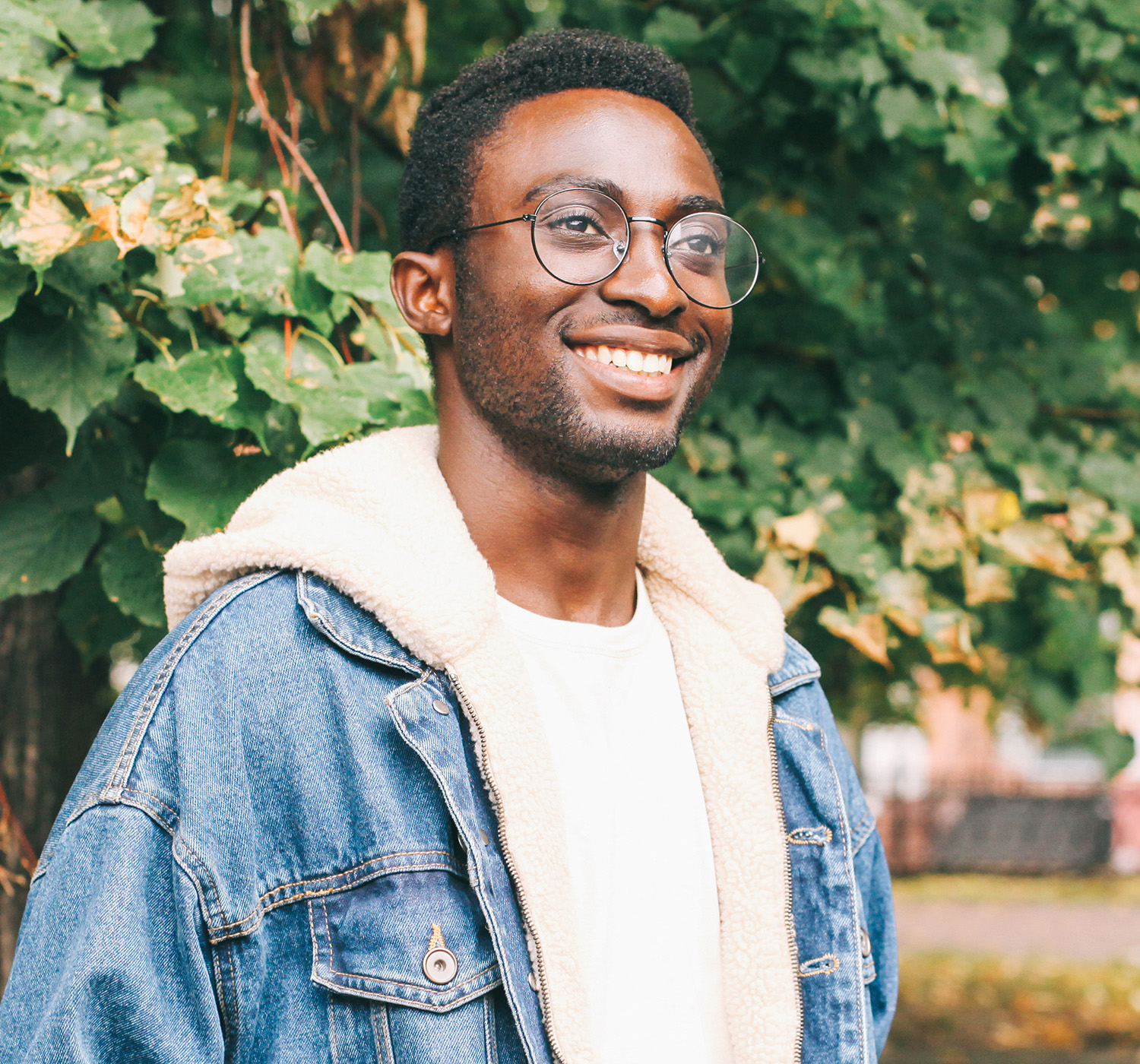 Man standing outside smiling with beautiful straight teeth